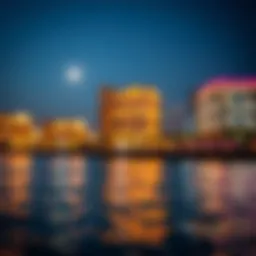 Night view of JBR Walk waterfront with illuminated buildings