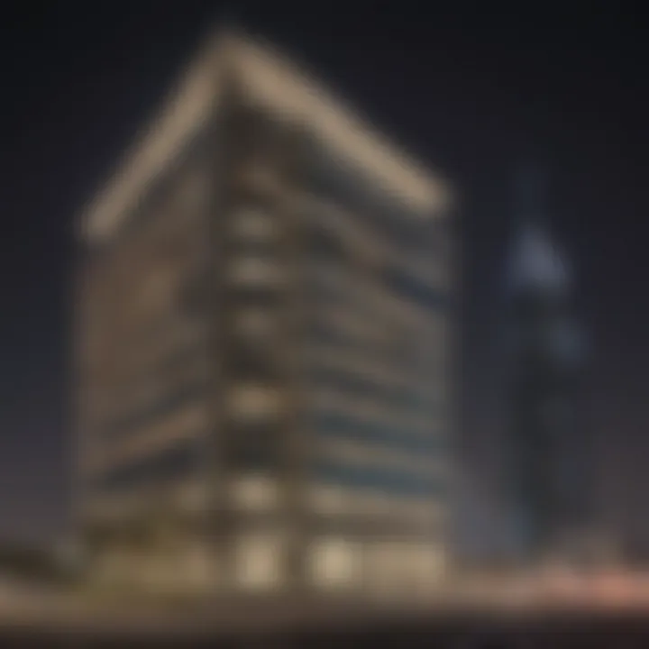 Nighttime view of the New Al Shafar Building illuminated against the Dubai skyline.